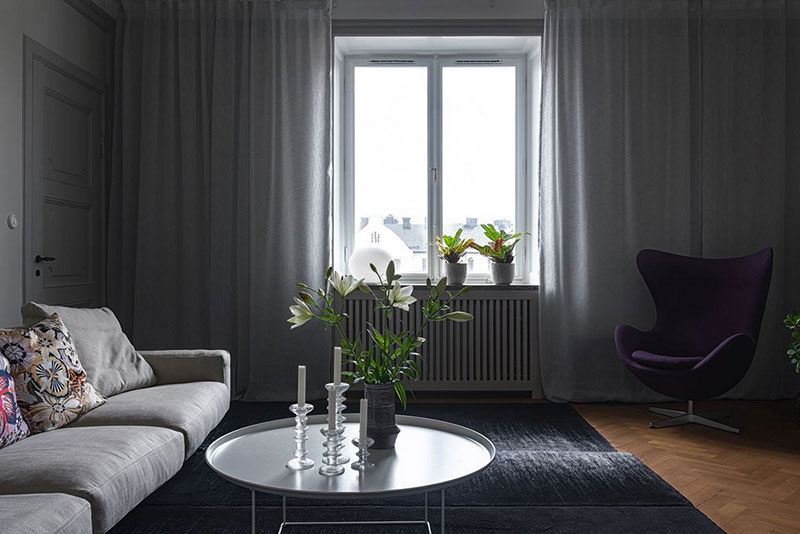 Красивая открытая кухня и приглушенная атмосфера: квартира в Стокгольме