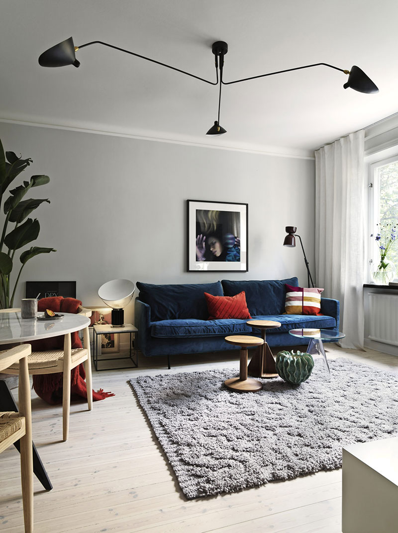 Класс! Стильные интерьеры и яркий текстиль: небольшая квартира для мужчины в Стокгольме (40 кв. м)