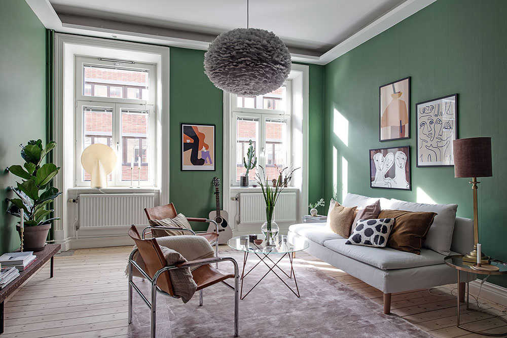 Скандинавская квартира с зелёной гостиной
