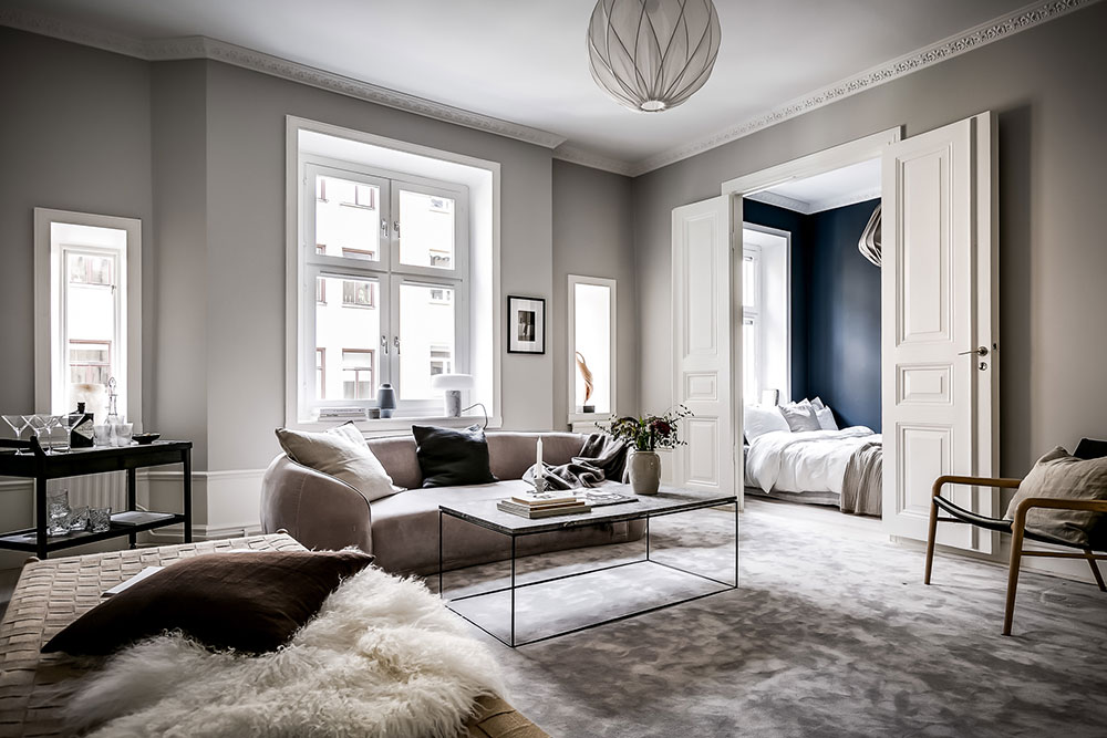Modern scandinavian design in beige tones in old house