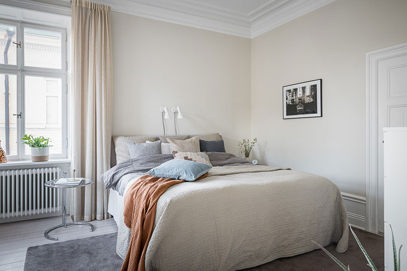 Нежность и спокойствие: мягкий интерьер скандинавской квартиры