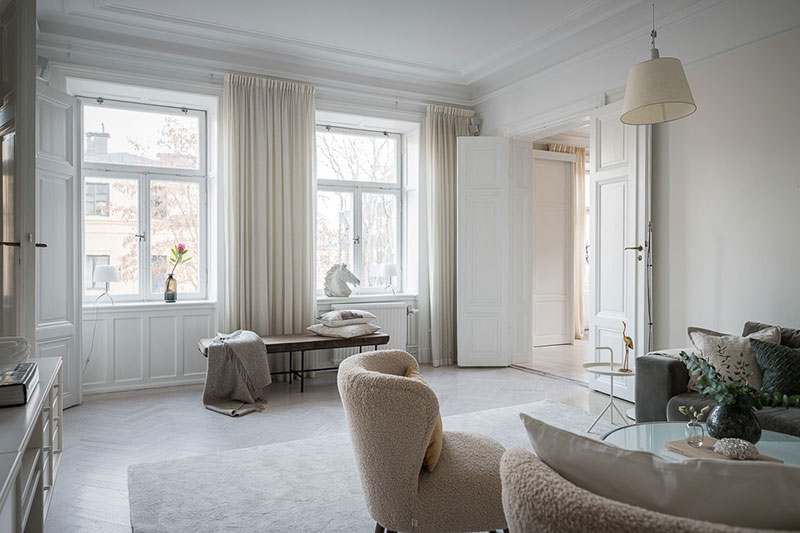 Нежность и спокойствие: мягкий интерьер скандинавской квартиры