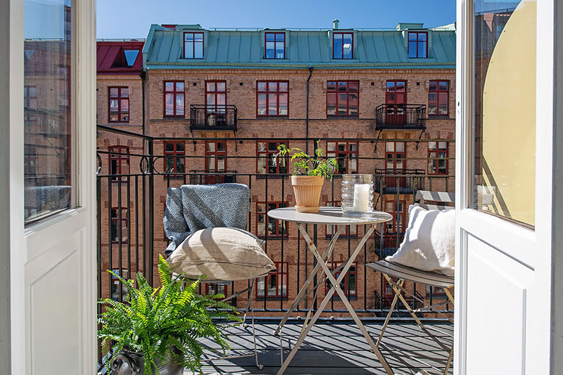 Винтажные детали для просторной городской квартиры в Гётеборге