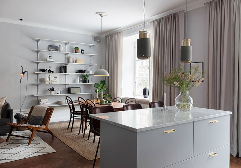 Стильный серый в интерьере современной квартире в Швеции
