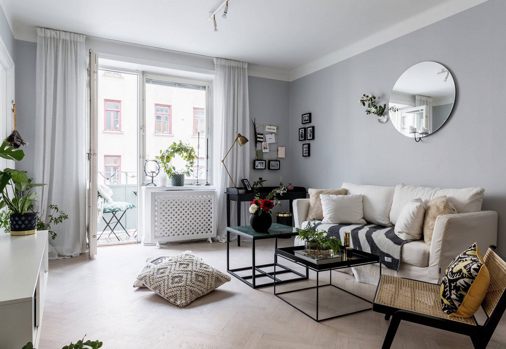 Светлая квартира в Швеции с тёмными акцентами ярким декором