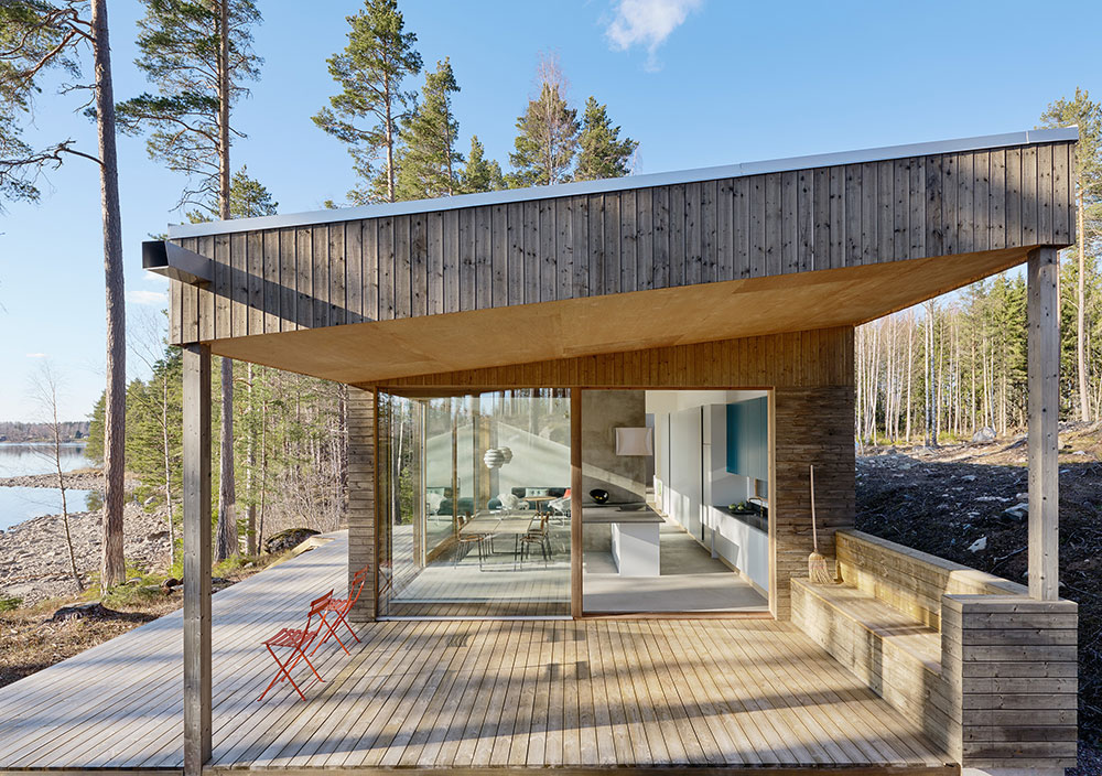 Дом с простым дизайном и чудесным видом на озеро в Швеции (120 кв.м)