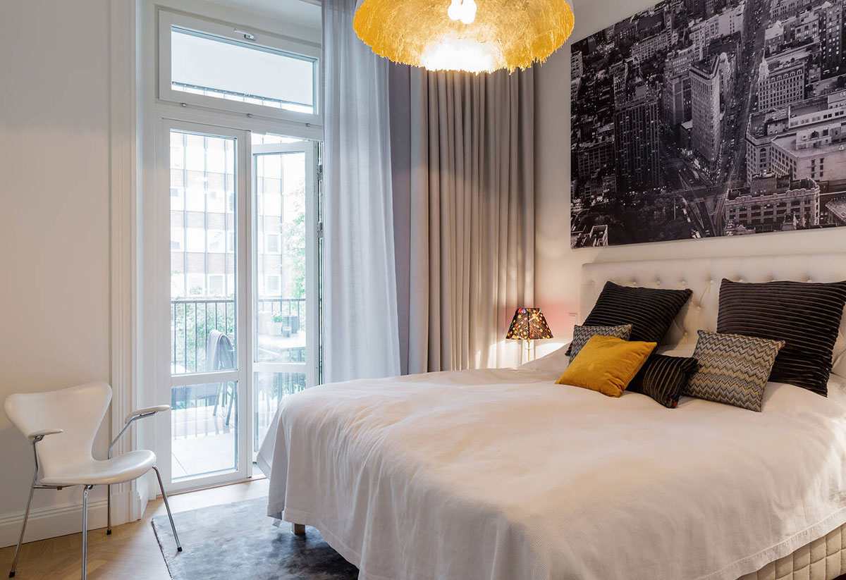 Просторный комнаты и классические детали: элегантные современные апартаменты в Стокгольме