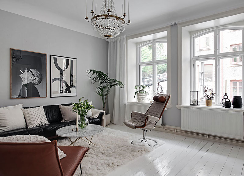Кухня с открытой кирпичной стеной и элегантная гостиная: квартира в Гётеборге (82 кв. м)