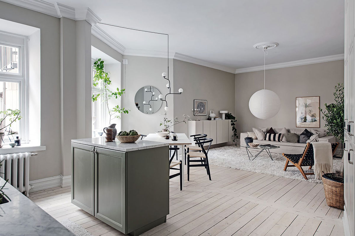 Зелёная кухня и неправильная планировка: красивая двухкомнатная квартира в Швеции (71 кв. м)