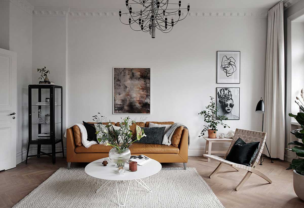 Светлая квартира с кожаным диваном и вкусным декором в Швеции (94 кв. м)