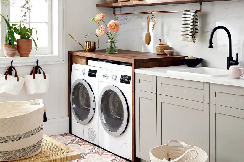 How to Hide a Washer and Dryer in the Kitchen with Style and Function